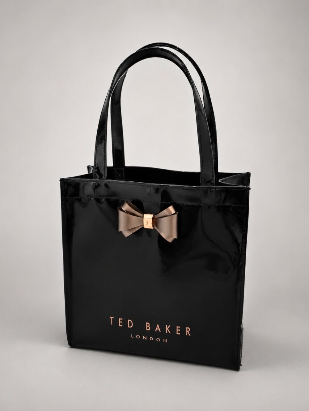 Ted Baker Black Patent Vinyl Tote Bag with Metallic Bow Accent GUC
